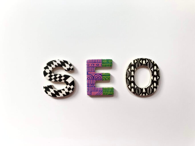 A visual representation of the term "SEO" on white background.