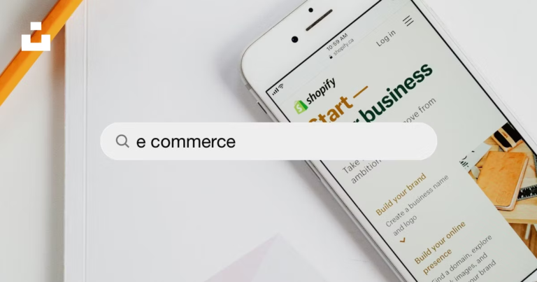 A smartphone with the word "ecommerce" displayed on it, showcasing digital success.